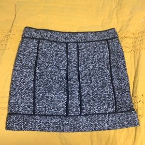 NWOT mixed fabric mini skirt.